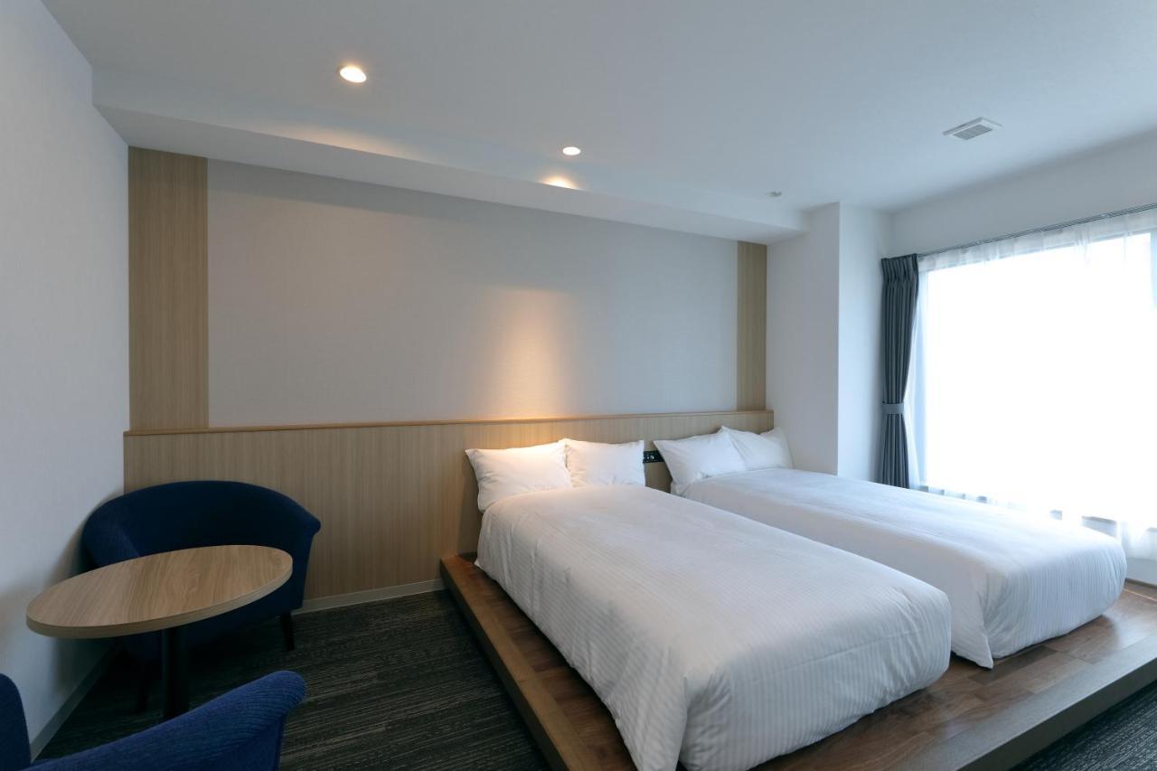 At Inn Hotel Toyotashi Eki Toyota  Eksteriør billede